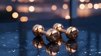 Golden luxury cufflinks with reflective surface on dark background with bokeh lights and water drops creating elegant atmosphere for formal wear.