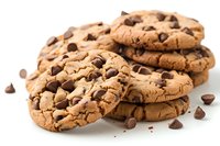 Fresh baked chocolate chip cookies stacked on white background with scattered chocolate chips, crispy edges and soft centers showing classic homestyle baking.