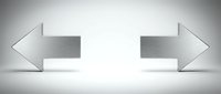 Two metallic silver arrows pointing in opposite directions on white background symbolizing choice, decision, conflict or different paths forward.