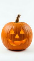 Carved Halloween pumpkin jack-o-lantern with glowing face isolated on white background for seasonal decorations and autumn holiday designs.