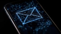 Glowing digital envelope icon on smartphone screen with blue particle effects and dark background, representing electronic communication technology.