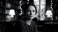 Young woman sitting in cozy library with warm lighting and bokeh background. Contemplative mood for reading, studying, and intellectual pursuits.