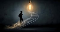 Businessman climbing glowing spiral staircase toward bright lightbulb representing career growth, success journey, innovation and achievement in dark space.