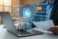 Business professional analyzing digital data analytics dashboard with holographic interface displaying charts graphs and statistics on laptop computer.