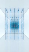 Symmetrical modern architecture with glass panels and blue tones creating depth, featuring minimalist design with motivational text overlay for corporate branding and contemporary aesthetics.