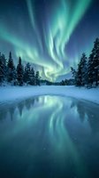 Spectacular aurora borealis dancing over snow-covered forest with frozen river reflecting green northern lights in winter wilderness landscape.