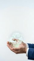 Businessman in formal attire holding glowing recycling symbol with digital particles, representing sustainable business practices, environmental responsibility, and green energy solutions for corporate sustainability initiatives.