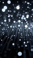 Glowing fiber optic strands emit white light dots against dark background creating magical bokeh effect. Abstract technology concept for digital communications.