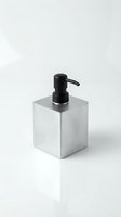 Modern stainless steel soap dispenser with black pump isolated on white background for bathroom and kitchen design projects.
