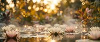 Elegant outdoor dinner table setting with floating lotus flowers, candles and warm bokeh lights creating romantic ambiance for special occasions and celebrations.