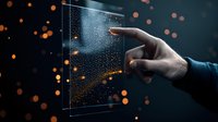 Finger touching transparent glass screen with water drops against dark background with glowing orange bokeh lights, futuristic technology concept.