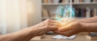 Two hands gently holding glowing Earth globe with network connections, symbolizing global unity, environmental protection and sustainable future collaboration.