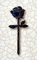 Stained glass style deep blue rose with golden outline on cracked white background. Geometric mosaic design creates elegant floral art piece for decorative use.