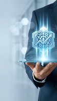 Businessman holding tablet with glowing hexagonal AI network icon representing artificial intelligence and digital transformation in modern business technology.