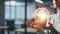 Young businesswoman holding glowing digital brain hologram with neural network connections in modern office environment representing artificial intelligence.