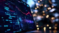 Financial market data visualization with glowing blue and pink charts on dark display against blurred golden bokeh lights creating modern trading atmosphere.