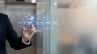 Businessman hand touching holographic digital interface with regulatory compliance icons and connected network symbols in modern office environment.