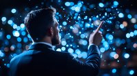 Silhouette of businessman pointing at glowing blue bokeh lights against dark background, leadership concept for business presentations and success stories.