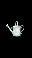 Vintage green watering can with ornate floral details, isolated on transparent background. Ready for t-shirts, clipart, stickers, print-on-demand, and sublimation designs.