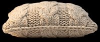 Cozy cable knit throw pillow in beige, isolated on transparent background. Great for home decor clipart, T-shirt design, stickers, sublimation, and print on demand projects.