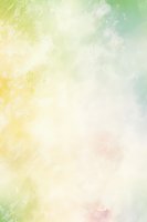 Soft pastel watercolor background with gentle yellow, green and pink hues blending into dreamy abstract texture for spring designs and artistic projects.