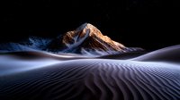Dramatic mountain peak illuminated by golden sunlight rises above rippling sand dunes in ethereal desert landscape with dark moody atmosphere.
