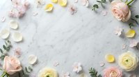 Delicate spring flower frame with pink roses, ranunculus and petals on marble background. Perfect for wedding invitations, greeting cards and romantic designs.