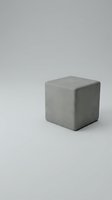 Gray concrete cube block isolated on white background for modern minimalist design and architectural visualization projects.