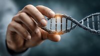 Hand holding glowing DNA spiral structure with genetic code modification concept against dark background, science and biotechnology visualization.