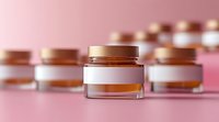 Luxury cosmetic cream jars on pink background with soft focus and bokeh effect, elegant skincare product presentation for beauty and wellness industry.