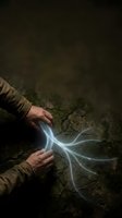 Male hands in military camouflage sleeves holding glowing white energy light streams on dark cracked ground surface for fantasy gaming concepts.
