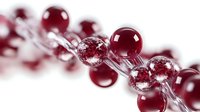 Burgundy and clear glass spheres arranged in diagonal line with selective focus creating depth and modern abstract composition on white background.