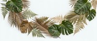 Tropical leaf garland with monstera and palm fronds in green and gold tones isolated on white background for party decoration and botanical design projects.