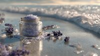 Lavender bath salt scrub in glass jar with dried flowers on marble surface for spa relaxation and skincare routine.