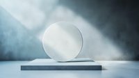 Minimalist product display platform with floating white circle against misty blue background, dramatic lighting creates ethereal atmosphere for luxury presentation.