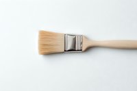 Clean wooden paintbrush with natural bristles and metal ferrule on white background, isolated flat lay view for art and craft projects.