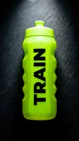 Bright neon yellow sports water bottle with black text on dark textured background, isolated for fitness and hydration product design use.