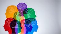 Colorful human head silhouettes with brain, lightbulb and gear icons representing creativity, innovation and teamwork in business and education concepts.