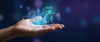 Businessman hand holding glowing holographic stock market chart with upward trending arrows and financial data visualization on dark blue background.