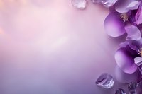 Purple orchid flowers and ice cubes arranged on soft gradient background with copy space for spa, wellness, or beauty product promotion.