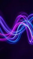 Abstract neon light trails in purple and blue creating flowing wave patterns on dark background for digital art and modern design projects.