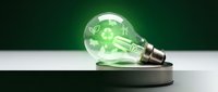 Green glowing light bulb with recycling symbol inside representing eco-friendly energy solutions and sustainable innovation for environmental projects.