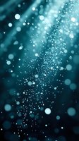 Magical glowing bokeh lights scattered on dark turquoise background create dreamy atmosphere with blurred circles and sparkles floating in space.