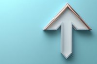 White upward pointing arrow on light blue background with soft shadow effect creates minimalist business concept for growth, success and progress.