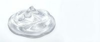 Clear plastic takeout container lid isolated on white background, ready for food packaging design, restaurant supplies, and commercial use.
