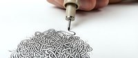 Young adult male hand holding technical pen drawing intricate abstract line patterns on white paper, demonstrating artistic illustration technique for design, creativity, and fine art projects.