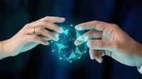 Protective hands surrounding glowing digital network connection with geometric patterns on dark blue background for technology and security concepts.