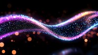 Glowing wave of sparkling particles with purple and blue light trails flowing on dark background with bokeh effect creates magical atmosphere.