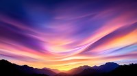 Dramatic mountain silhouettes against vibrant sunset sky with flowing purple and orange clouds creating ethereal atmosphere. Panoramic nature landscape at dusk.