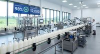 Modern pharmaceutical manufacturing facility with automated production line and efficiency monitoring displaying 98% performance metrics in sterile environment.